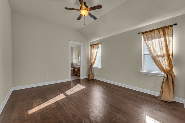 unfurnished room with ceiling fan, dark hardwood / wood-style flooring, and lofted ceiling