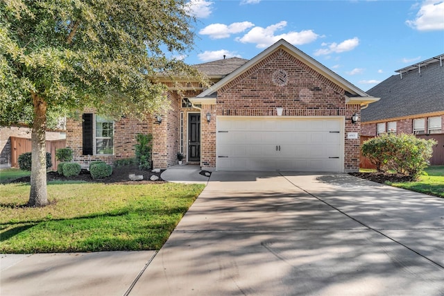 view of front of house with a garage and a front lawn