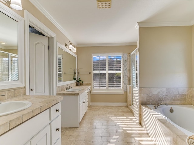 bathroom featuring tile patterned flooring, vanity, crown molding, and independent shower and bath