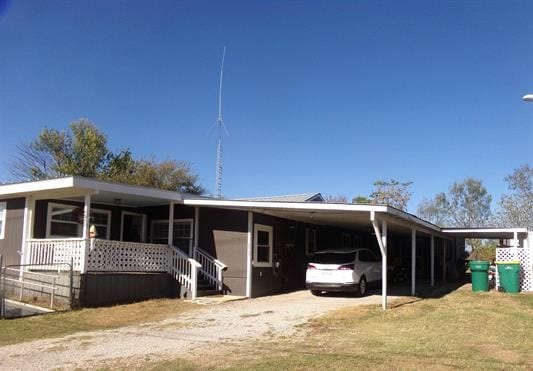 manufactured / mobile home with a carport