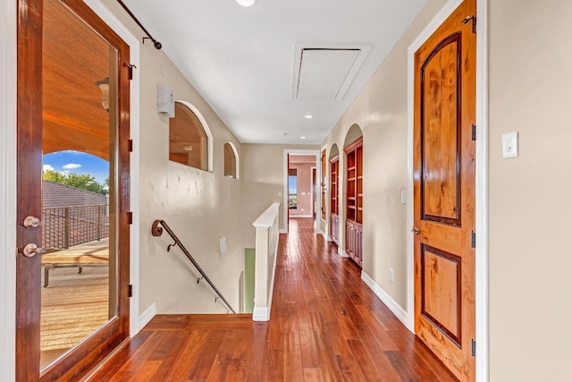 hallway featuring dark hardwood / wood-style flooring