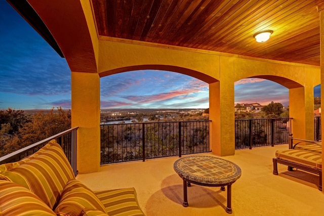 view of patio terrace at dusk