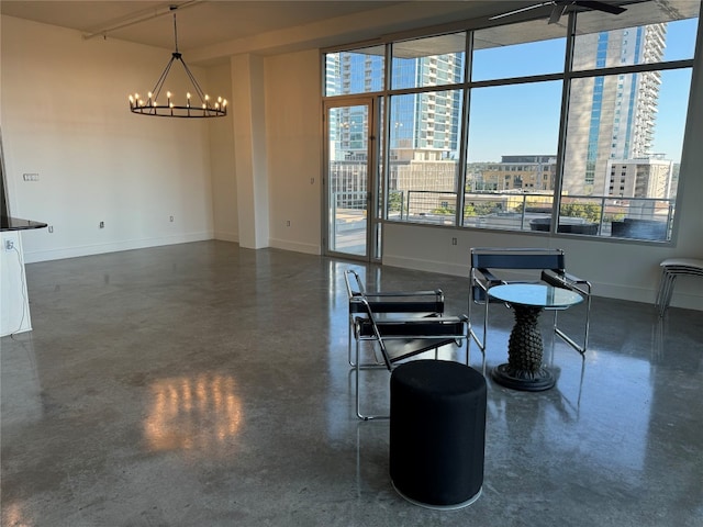 unfurnished dining area featuring a chandelier