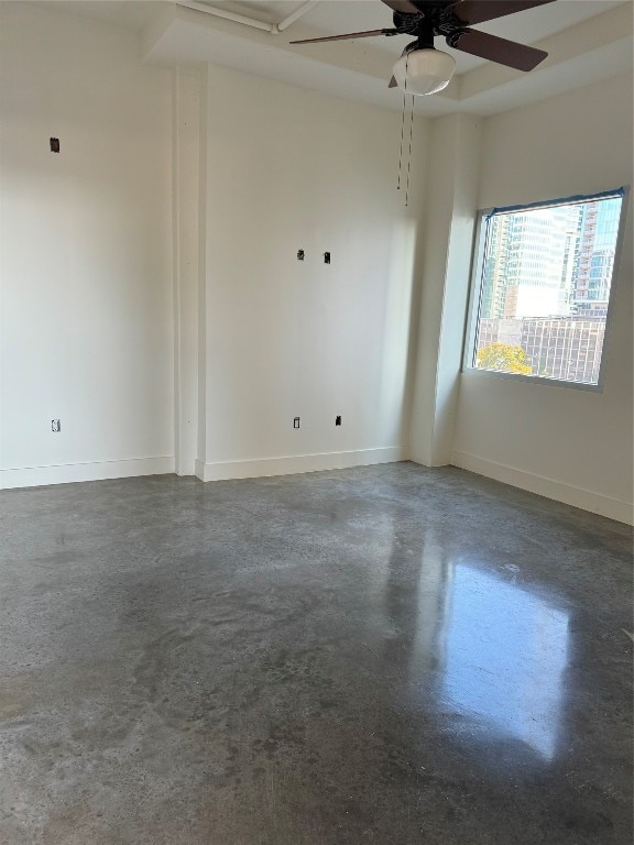 unfurnished room featuring ceiling fan