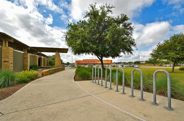 view of home's community with a lawn