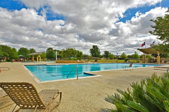 view of pool with a patio area