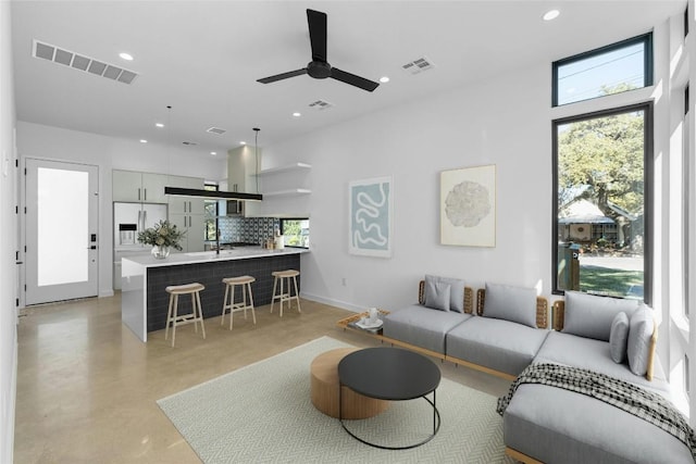 living room featuring ceiling fan