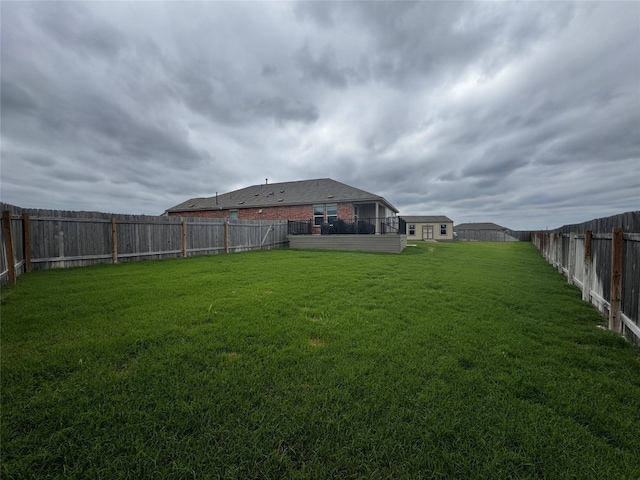 view of yard featuring a fenced backyard