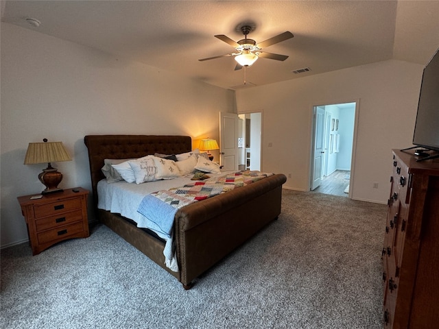 bedroom featuring baseboards, carpet floors, visible vents, and a ceiling fan