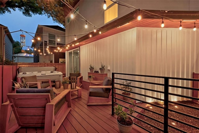 wooden deck featuring an outdoor hangout area and a jacuzzi