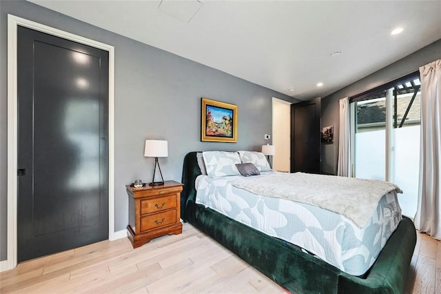 bedroom featuring light wood-type flooring