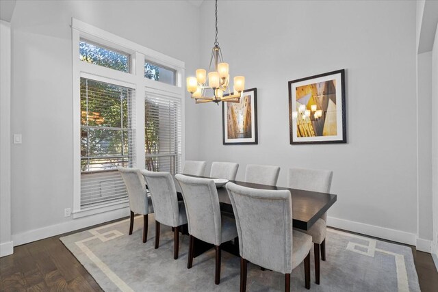 1503 Juliet St, Austin, TX 78704 - dining area with a chandelier and wood finished floors