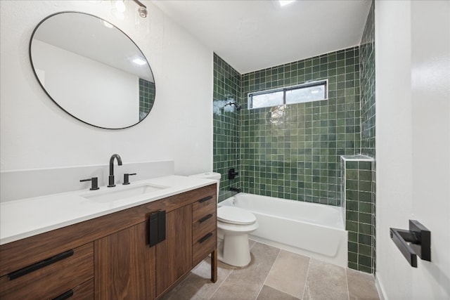 full bathroom featuring vanity, tiled shower / bath combo, and toilet