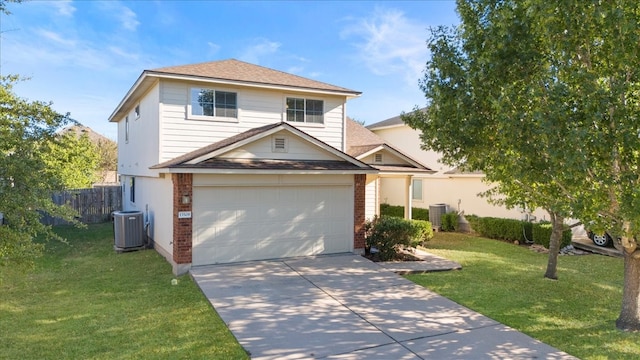 view of front of house featuring central AC, a garage, and a front lawn