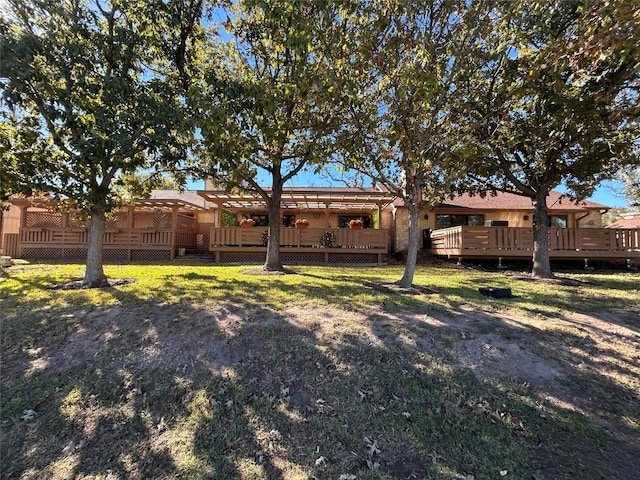 view of yard with a wooden deck