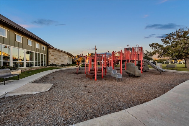 view of playground at dusk