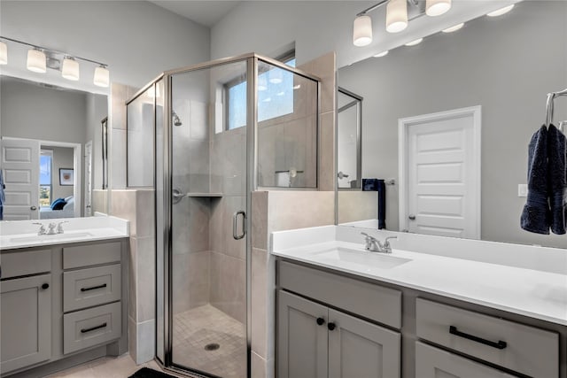 bathroom with vanity and walk in shower