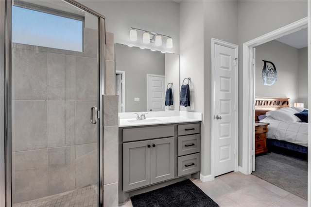 bathroom with vanity and a shower with shower door