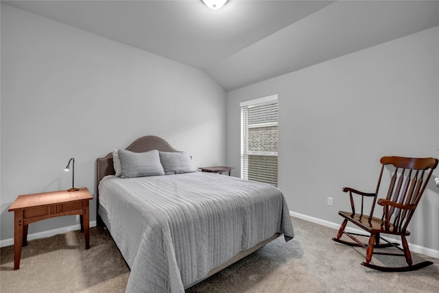 carpeted bedroom featuring vaulted ceiling