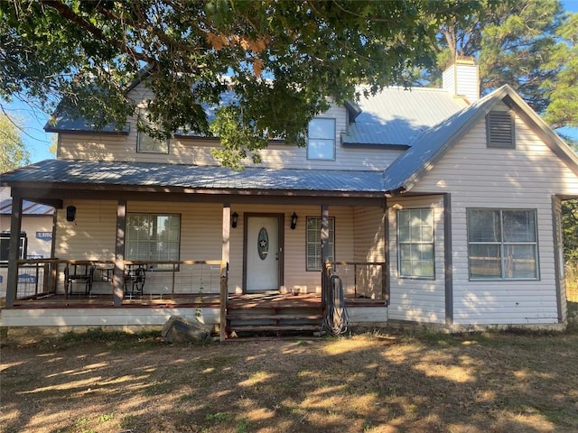 view of front of property featuring covered porch