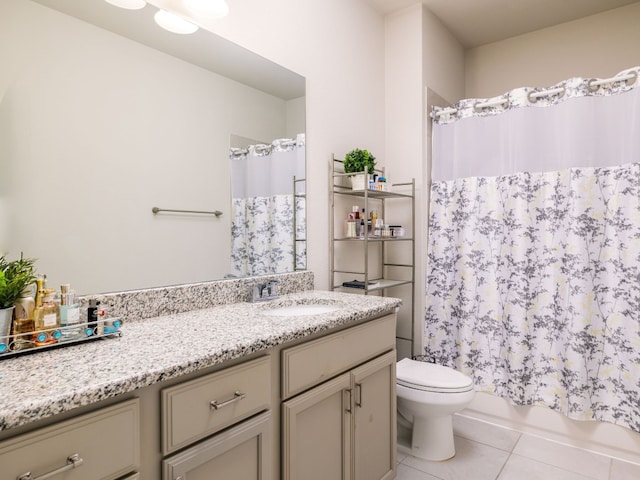 full bathroom with toilet, vanity, tile patterned flooring, and shower / tub combo with curtain