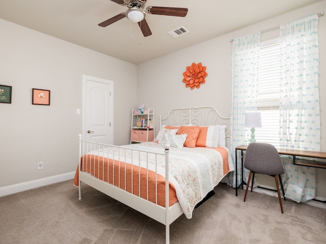 bedroom with ceiling fan and carpet flooring