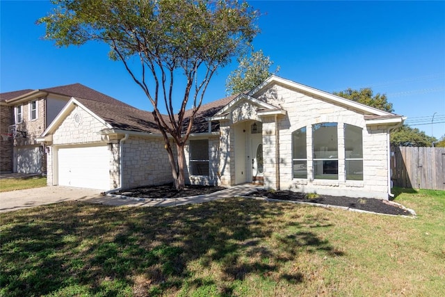 1709 Todd Ln, Cedar Park, TX 78613 - ranch-style house featuring stone siding, an attached garage, and driveway