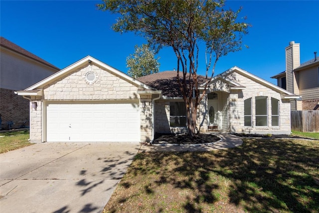 1709 Todd Ln, Cedar Park, TX 78613 - ranch-style home featuring stone siding, an attached garage, and concrete driveway
