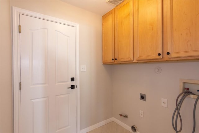 1709 Todd Ln, Cedar Park, TX 78613 - laundry area featuring hookup for a washing machine, hookup for a gas dryer, cabinet space, baseboards, and hookup for an electric dryer