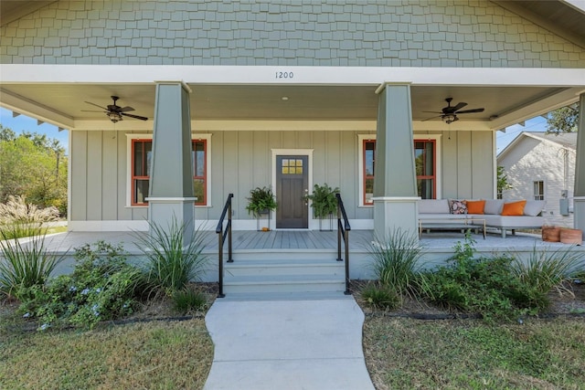 entrance to property featuring ceiling fan and a porch