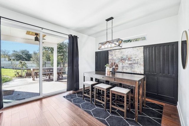 dining room with hardwood / wood-style flooring