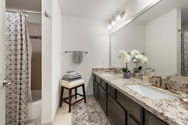 bathroom with tile patterned floors, shower / tub combo with curtain, and vanity