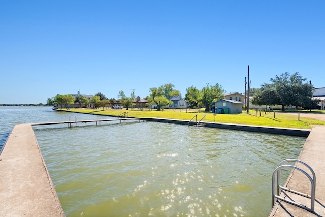 dock area with a water view