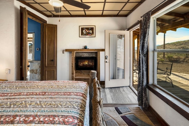 9301 Terlingua Ranch Rd Unit 8025, Alpine, TX 79852 - bedroom with ceiling fan and dark wood-type flooring