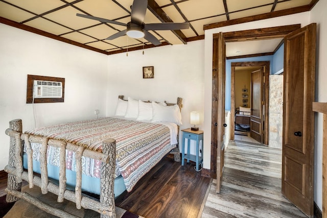 9301 Terlingua Ranch Rd Unit 8025, Alpine, TX 79852 - bedroom with ornamental molding, a wall unit AC, ceiling fan, and dark wood-type flooring