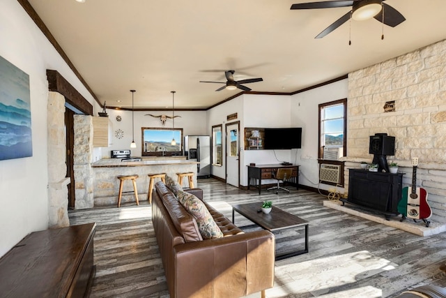 9301 Terlingua Ranch Rd Unit 8025, Alpine, TX 79852 - living room with hardwood / wood-style floors, ceiling fan, and crown molding