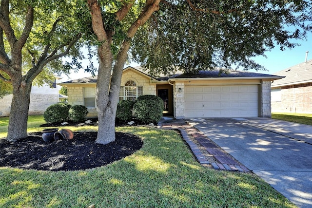 ranch-style home with a front lawn and a garage