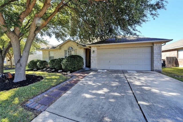 ranch-style home featuring a garage