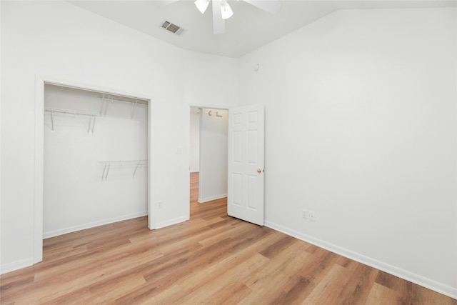 unfurnished bedroom with ceiling fan, a closet, and light hardwood / wood-style floors