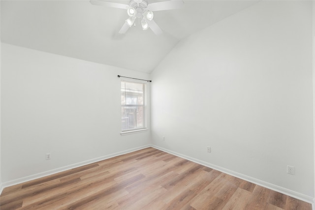 unfurnished room with vaulted ceiling, ceiling fan, and light wood-type flooring