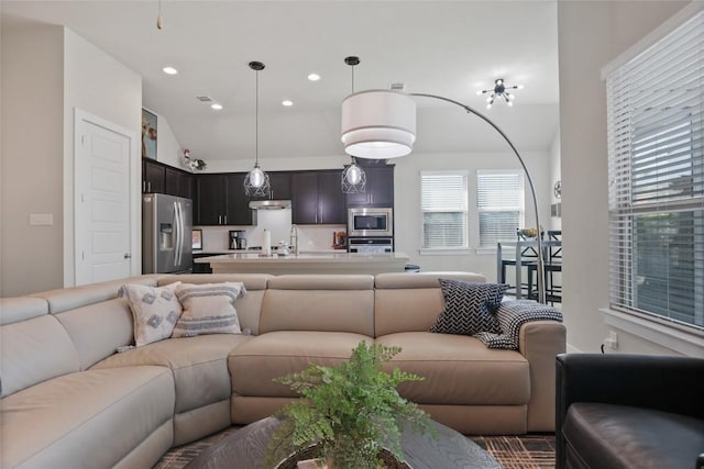 living room with vaulted ceiling