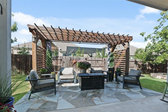 view of patio / terrace with a pergola and an outdoor living space with a fire pit