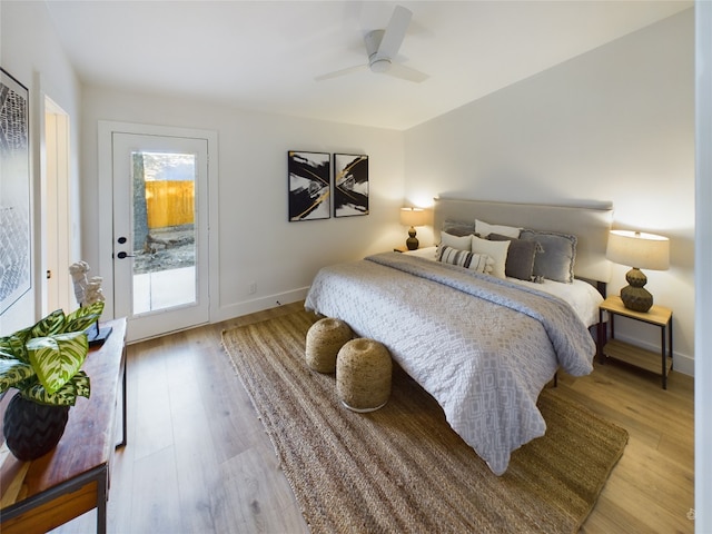 bedroom with ceiling fan, light hardwood / wood-style floors, and access to exterior