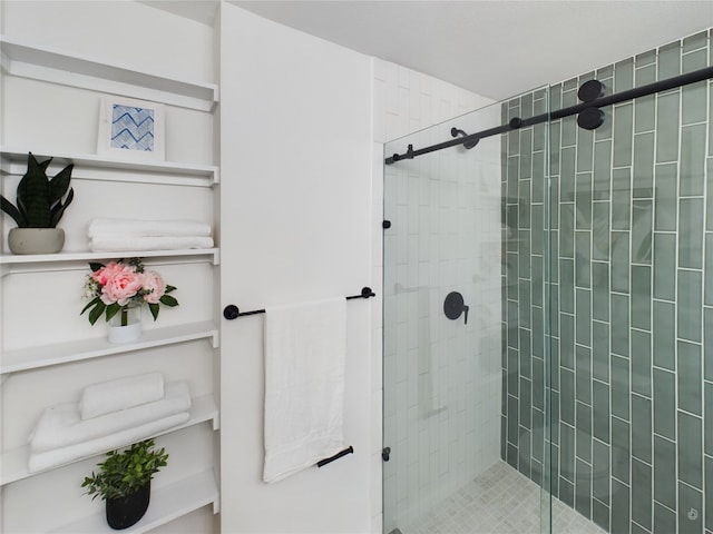 bathroom featuring an enclosed shower