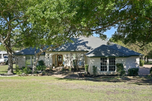 view of front of house with a front yard