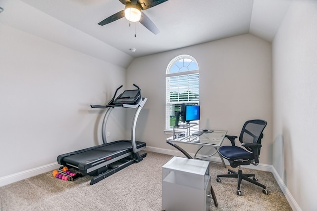 exercise area with carpet flooring, vaulted ceiling, and ceiling fan