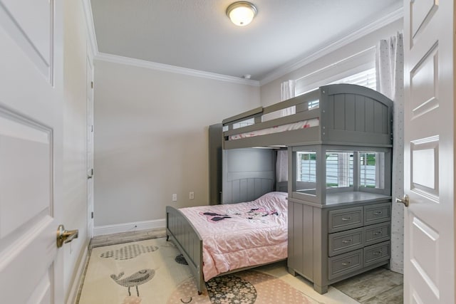 bedroom with ornamental molding