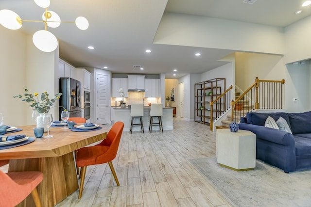 dining area featuring light hardwood / wood-style floors