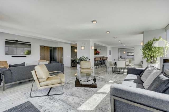 living room with light hardwood / wood-style floors