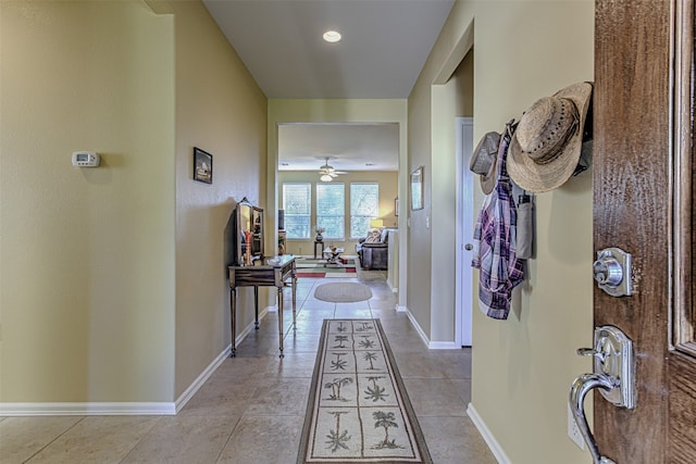 hallway with light tile patterned flooring